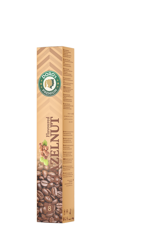 Doros Premium Kaffeekapseln Hazelnut in einer beigen Schachtel